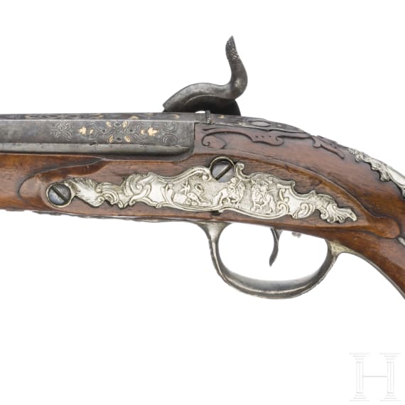 A German silver-mounted percussion pistol, circa 1780