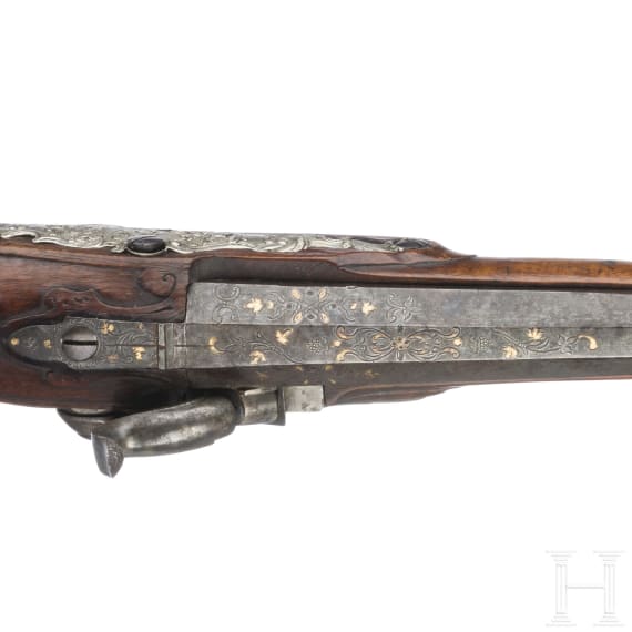 A German silver-mounted percussion pistol, circa 1780