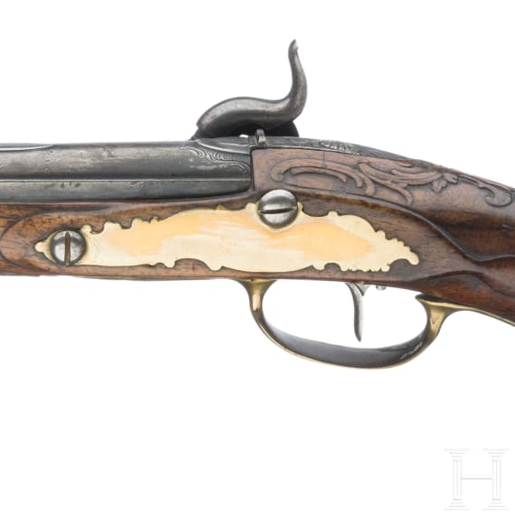 A German percussion pistol, circa 1780