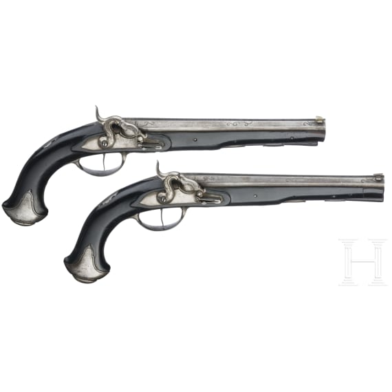 A cased pair of German percussion pistols by Johann Christoph Kuchenreuter in Steinweg near Regensburg, circa 1810