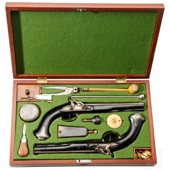 A cased pair of German percussion pistols by Johann Christoph Kuchenreuter in Steinweg near Regensburg, circa 1810