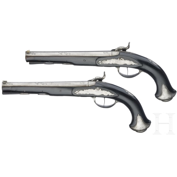 A cased pair of German percussion pistols by Johann Christoph Kuchenreuter in Steinweg near Regensburg, circa 1810