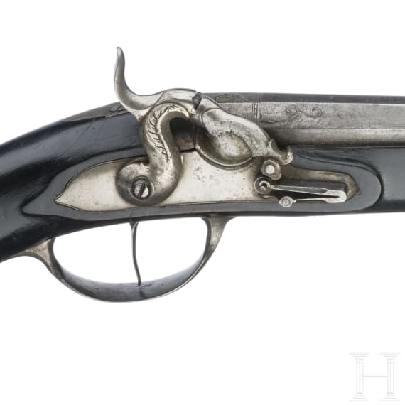 A cased pair of German percussion pistols by Johann Christoph Kuchenreuter in Steinweg near Regensburg, circa 1810