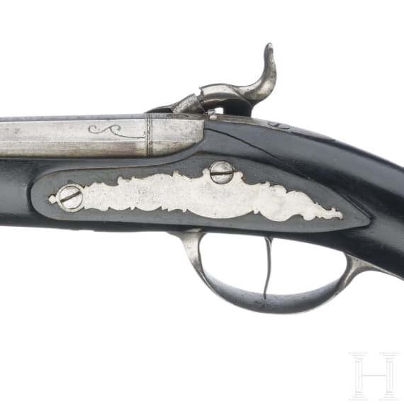 A cased pair of German percussion pistols by Johann Christoph Kuchenreuter in Steinweg near Regensburg, circa 1810