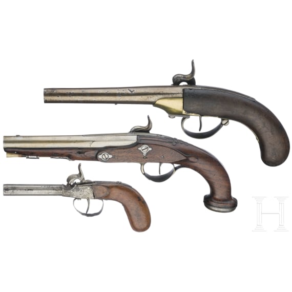 Three percussion pistols