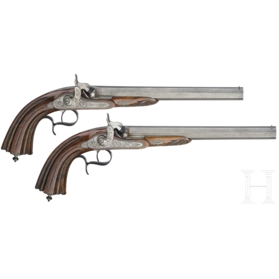 A pair of cased percussion pistols by Francis Marquis, Paris, circa 1840/50