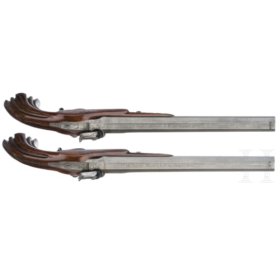 A pair of cased percussion pistols by Francis Marquis, Paris, circa 1840/50
