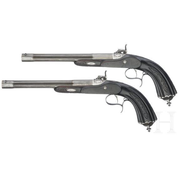 A pair of cased percussion pistols by Brun, Paris, circa 1850