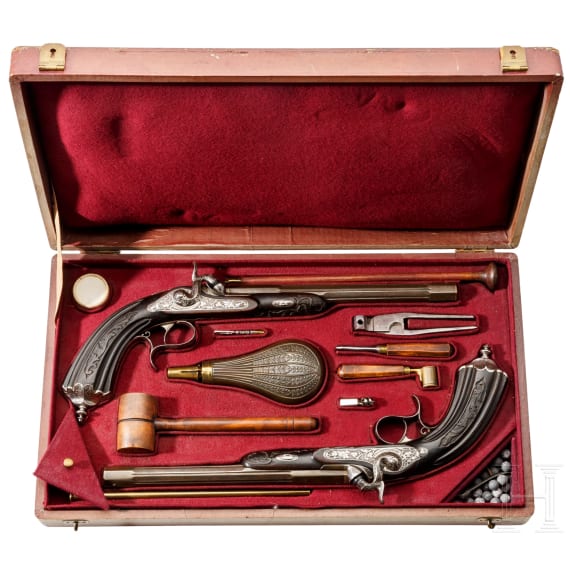 A pair of cased percussion pistols by Brun, Paris, circa 1850