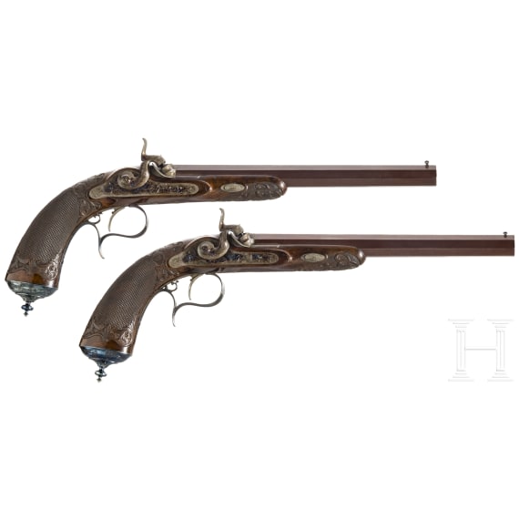 A pair of cased percussion pistols by Gastine Renette, Paris, circa 1850/60