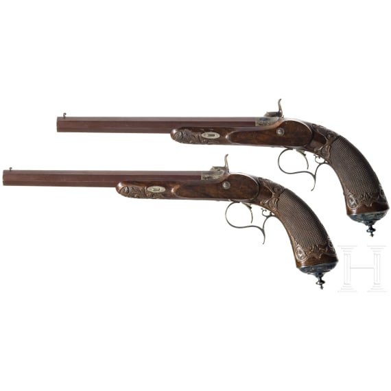 A pair of cased percussion pistols by Gastine Renette, Paris, circa 1850/60