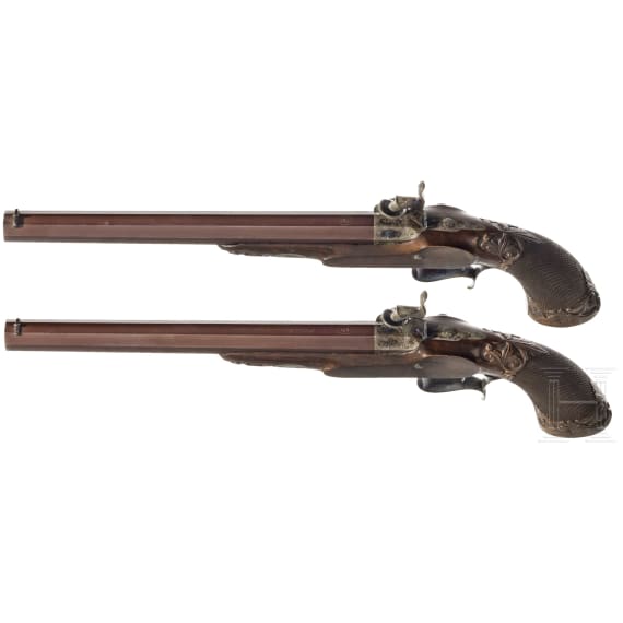 A pair of cased percussion pistols by Gastine Renette, Paris, circa 1850/60