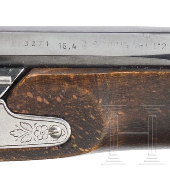 A percussion pistol with holster stock, Spanish replica by Dikar