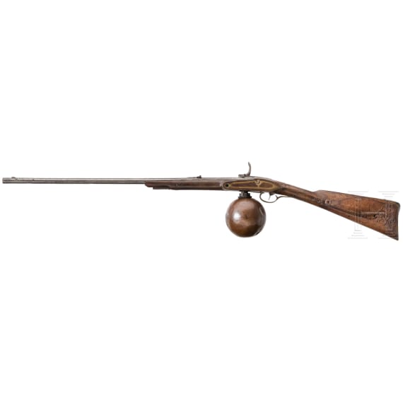 A German air rifle with ball reservoir and pump, circa 1780