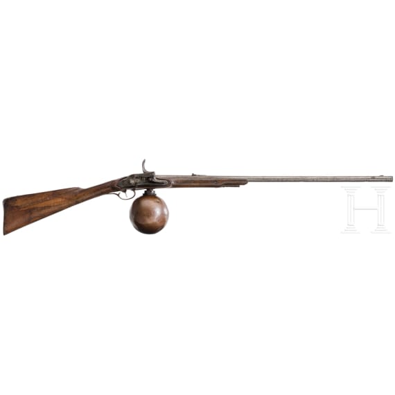 A German air rifle with ball reservoir and pump, circa 1780