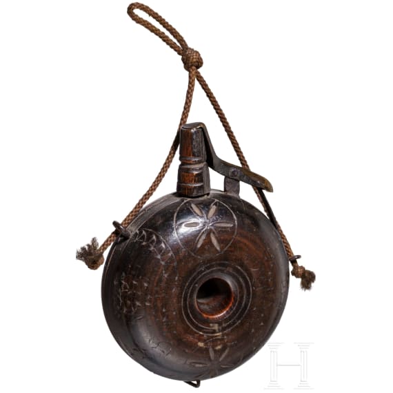 A small German military powder flask, early 17th century