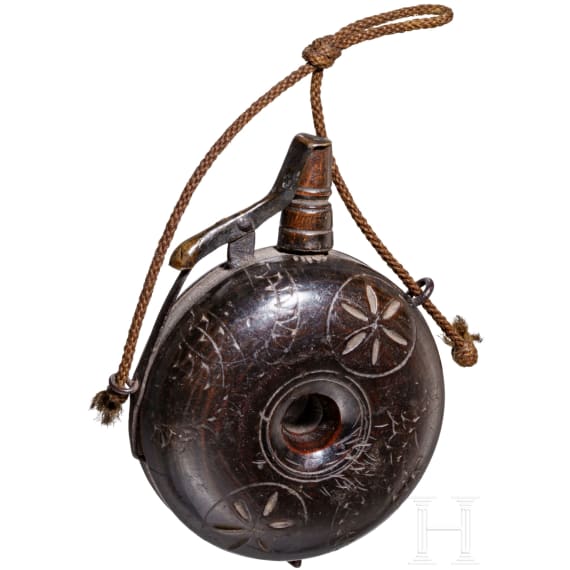A small German military powder flask, early 17th century