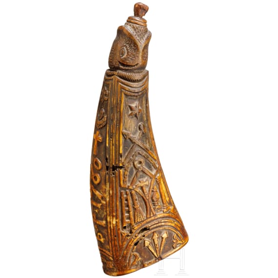 An elaborately carved Alpine horn powder flask, dated 1780