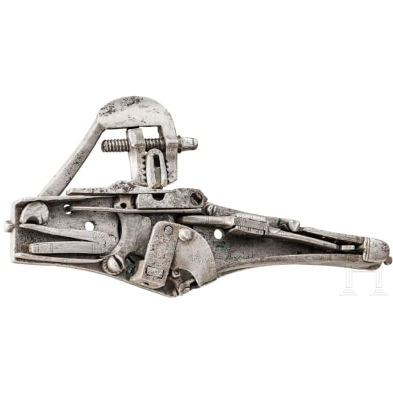 A German wheel lock with spring-loaded tension rod on the inside, circa 1570