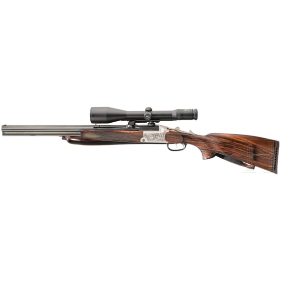 A combination gun Blaser BD 880 with Zeiss scope