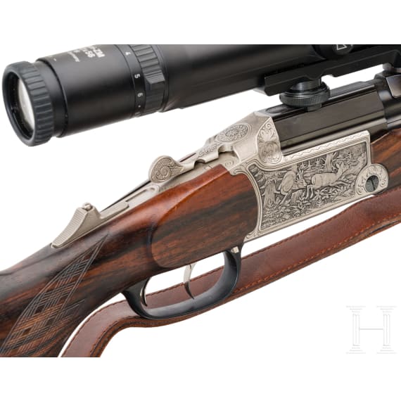 A combination gun Blaser BD 880 with Zeiss scope