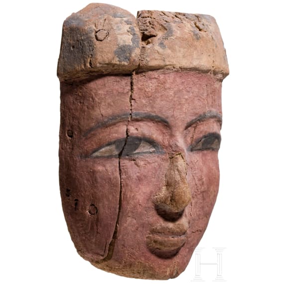 A painted wooden mummy mask, Late Period, mid-3rd of the 1st millennium B.C.