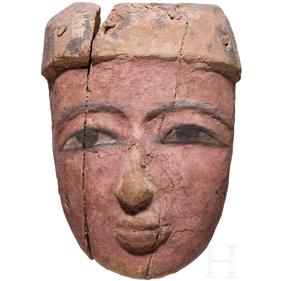 A painted wooden mummy mask, Late Period, mid-3rd of the 1st millennium B.C.
