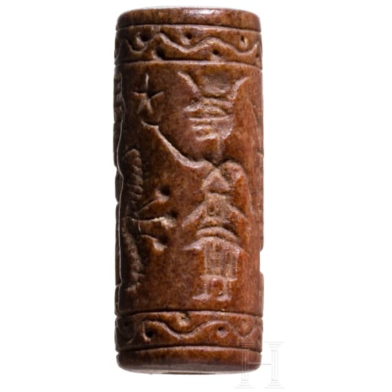 Ancient Babylonian cylinder seal made of brown jasper depicting a cult scene, approx. 1900&ndash;1700 B.C.
