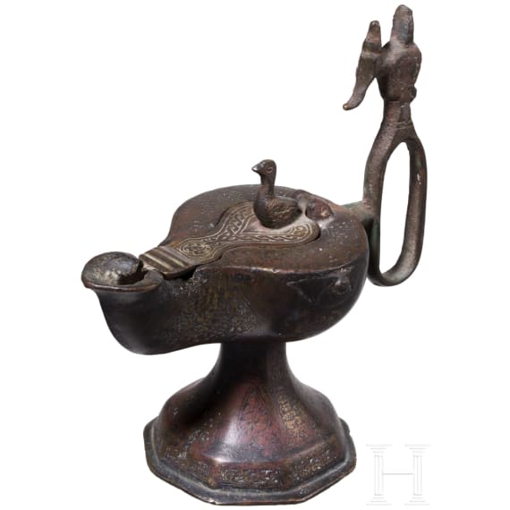 A bronze Ottoman oil lamp, Seljuk, 12th - 13th century