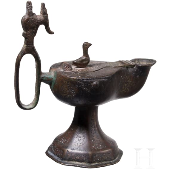 A bronze Ottoman oil lamp, Seljuk, 12th - 13th century