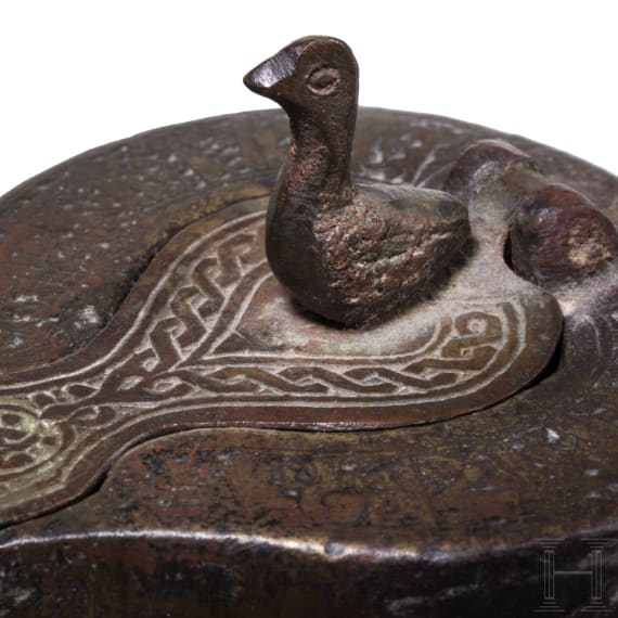 A bronze Ottoman oil lamp, Seljuk, 12th - 13th century