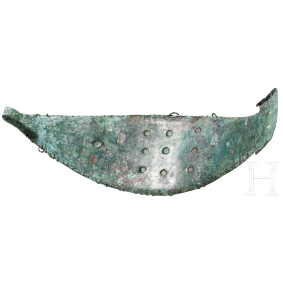 An early Etruscan belt fitting with clasp hook, mid-8th century B.C.