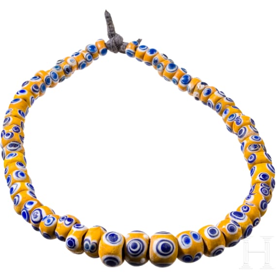 61 yellow-based eye beads, Celtic, 5th&ndash;4th century B.C.
