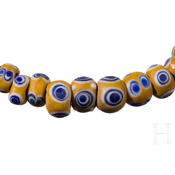 61 yellow-based eye beads, Celtic, 5th&ndash;4th century B.C.