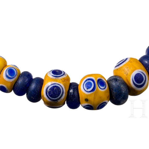 43 yellow-based and 42 dark blue glass beads, Celtic, 5th&ndash;4th century B.C.