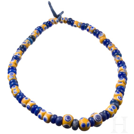 43 yellow-based and 42 dark blue glass beads, Celtic, 5th&ndash;4th century B.C.