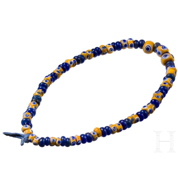 43 yellow-based and 42 dark blue glass beads, Celtic, 5th&ndash;4th century B.C.