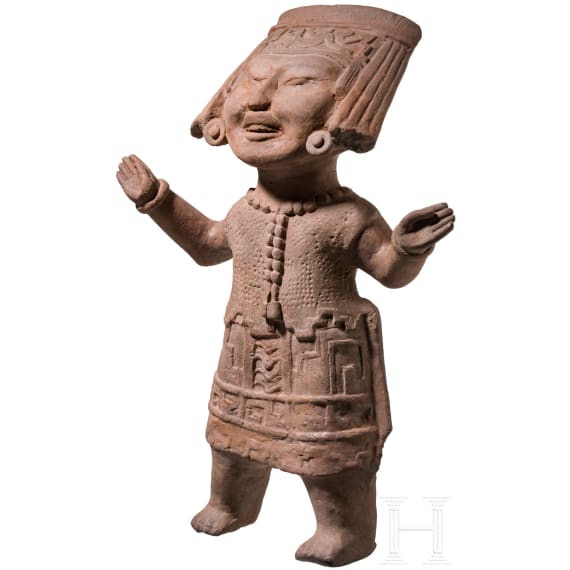 A Pre-Columbian "Sonriente" clay figure, Mexico, Veracruz, Remojadas, 600 to 900 A.D.