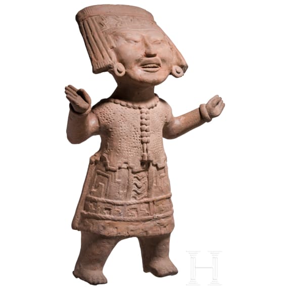 A Pre-Columbian "Sonriente" clay figure, Mexico, Veracruz, Remojadas, 600 to 900 A.D.