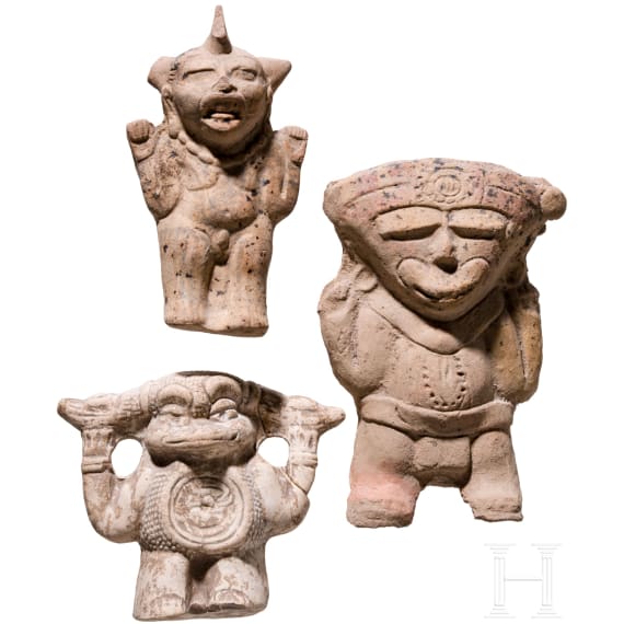 Three Pre-Columbian figural-shaped clay rattles, circa 300 - 1500 AD
