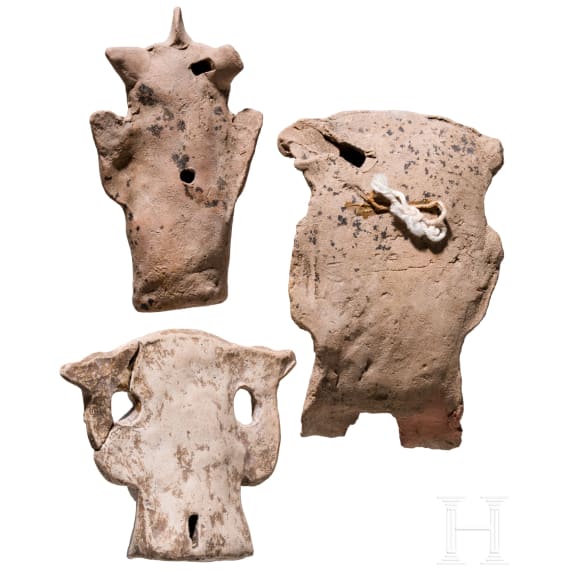Three Pre-Columbian figural-shaped clay rattles, circa 300 - 1500 AD