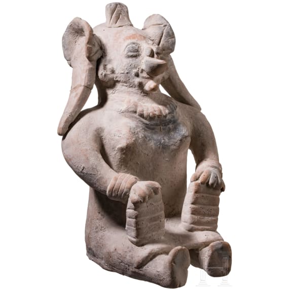A large Ecuadorian, pre-Colombian, painted female clay figure, probably 500 - 1000 A.D.