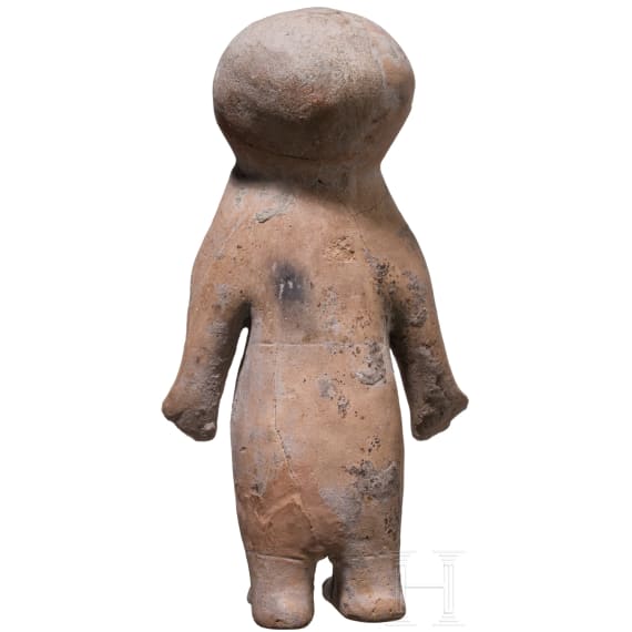 A large Ecuadorian, pre-Colombian, partially painted female clay figure, probably 500 - 1500 A.D.