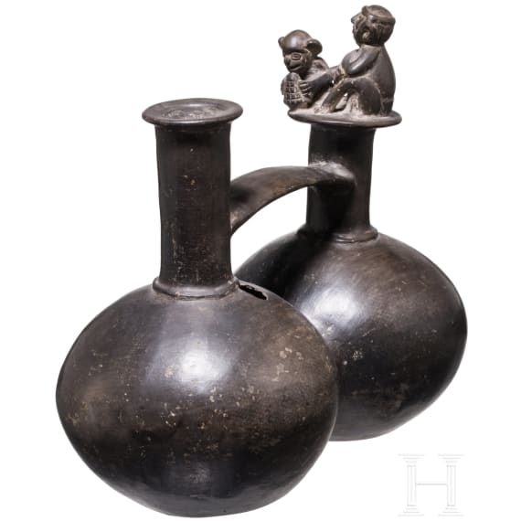 A Peruvian painted clay double-vessel, Chimu culture, probably 11th - 15th century