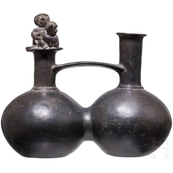 A Peruvian painted clay double-vessel, Chimu culture, probably 11th - 15th century
