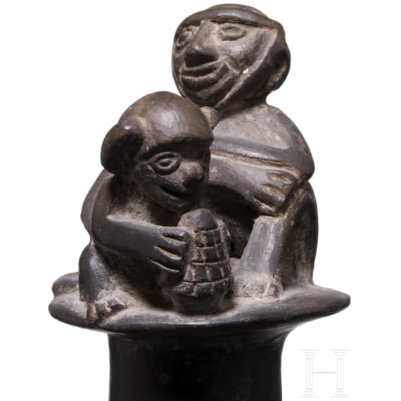 A Peruvian painted clay double-vessel, Chimu culture, probably 11th - 15th century