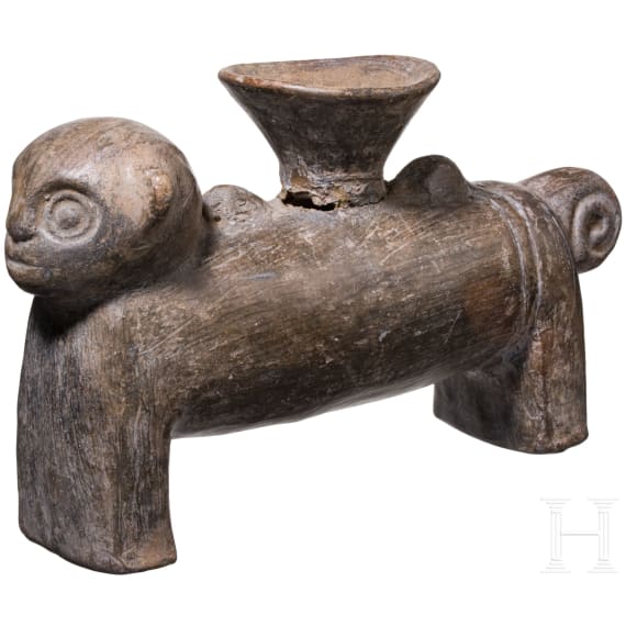 A Peruvian animal-shaped clay vessel, Chimu culture, probably 11th - 15th century