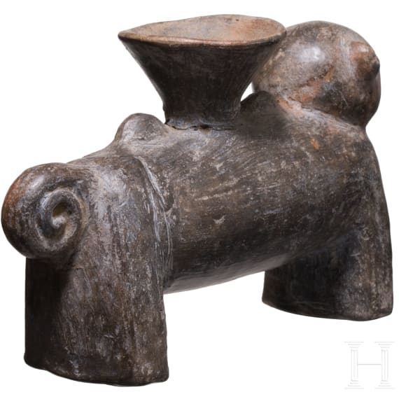 A Peruvian animal-shaped clay vessel, Chimu culture, probably 11th - 15th century
