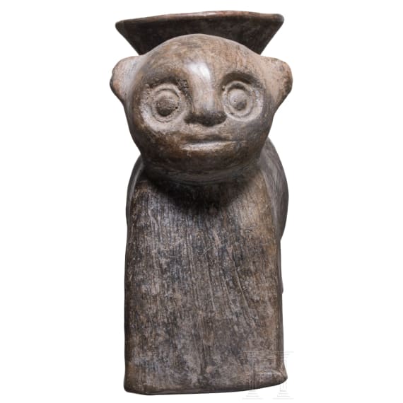 A Peruvian animal-shaped clay vessel, Chimu culture, probably 11th - 15th century