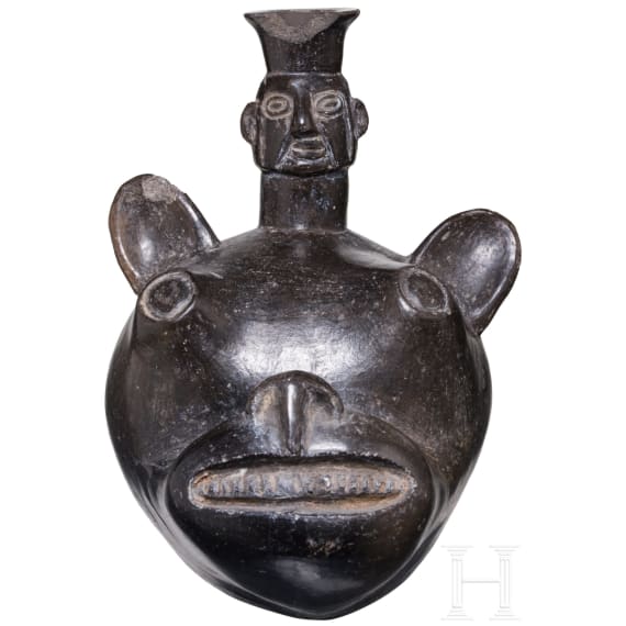 A Peruvian animal-head shaped blackware vessel, probably Chimu culture, 11th - 15th century